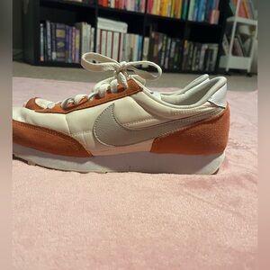 Nike Cream and deep orange colored Sneakers